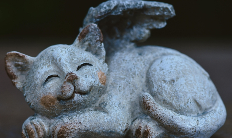 cat with angel wings statue