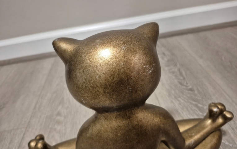 meditating cat statue
