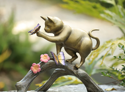cat and butterfly statue