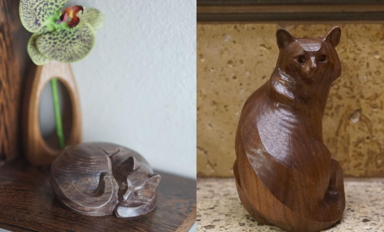 carved wooden cat statues