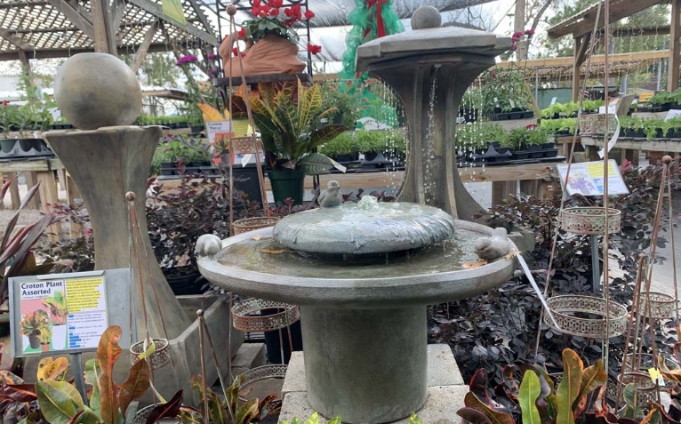 antique cat with solar butterfly garden statue