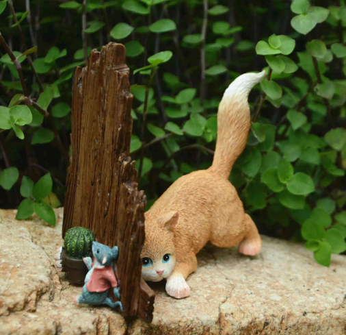 cat and mouse garden ornament