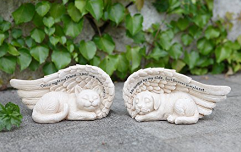 angel holding cat garden statue