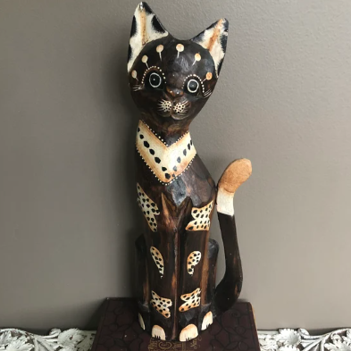 large wooden cat sculpture