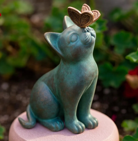 cat with butterfly on nose statue