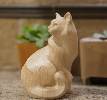 hand carved wooden cat statue