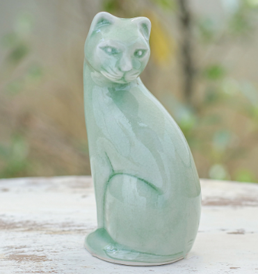 green cat statue