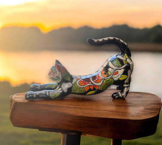 stretching cat figurine