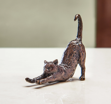 stretching cat statue