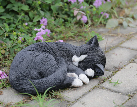 sleeping cat outdoor statue