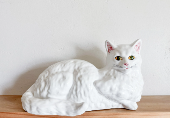 white cat sculpture
