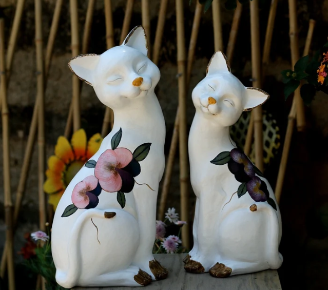 white cat garden statue