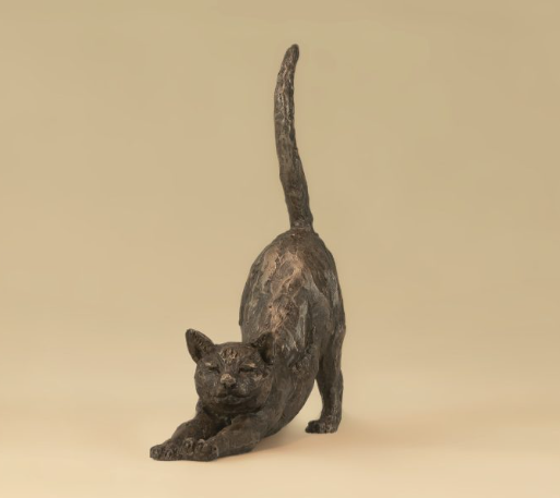 stretching cat sculpture