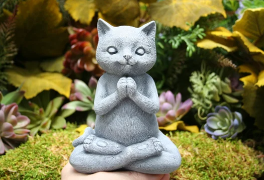praying cat statue