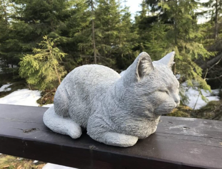 outdoor sleeping cat statue