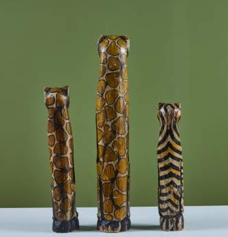 tall wooden cat statue