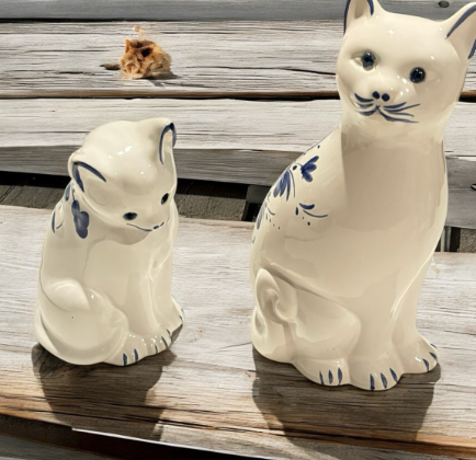 white porcelain cat figurines